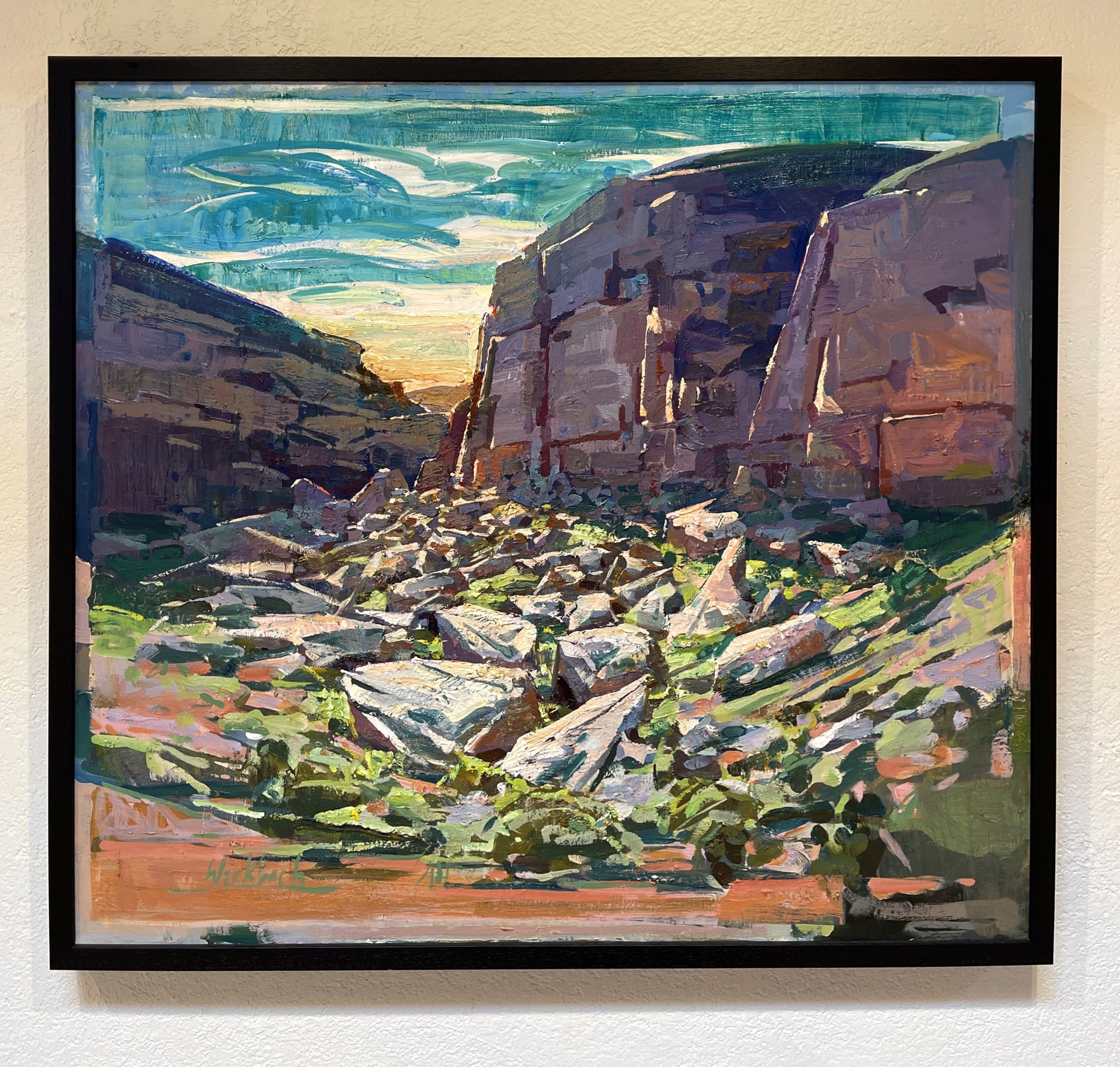 A painting of a rocky landscape with rocks in the foreground.