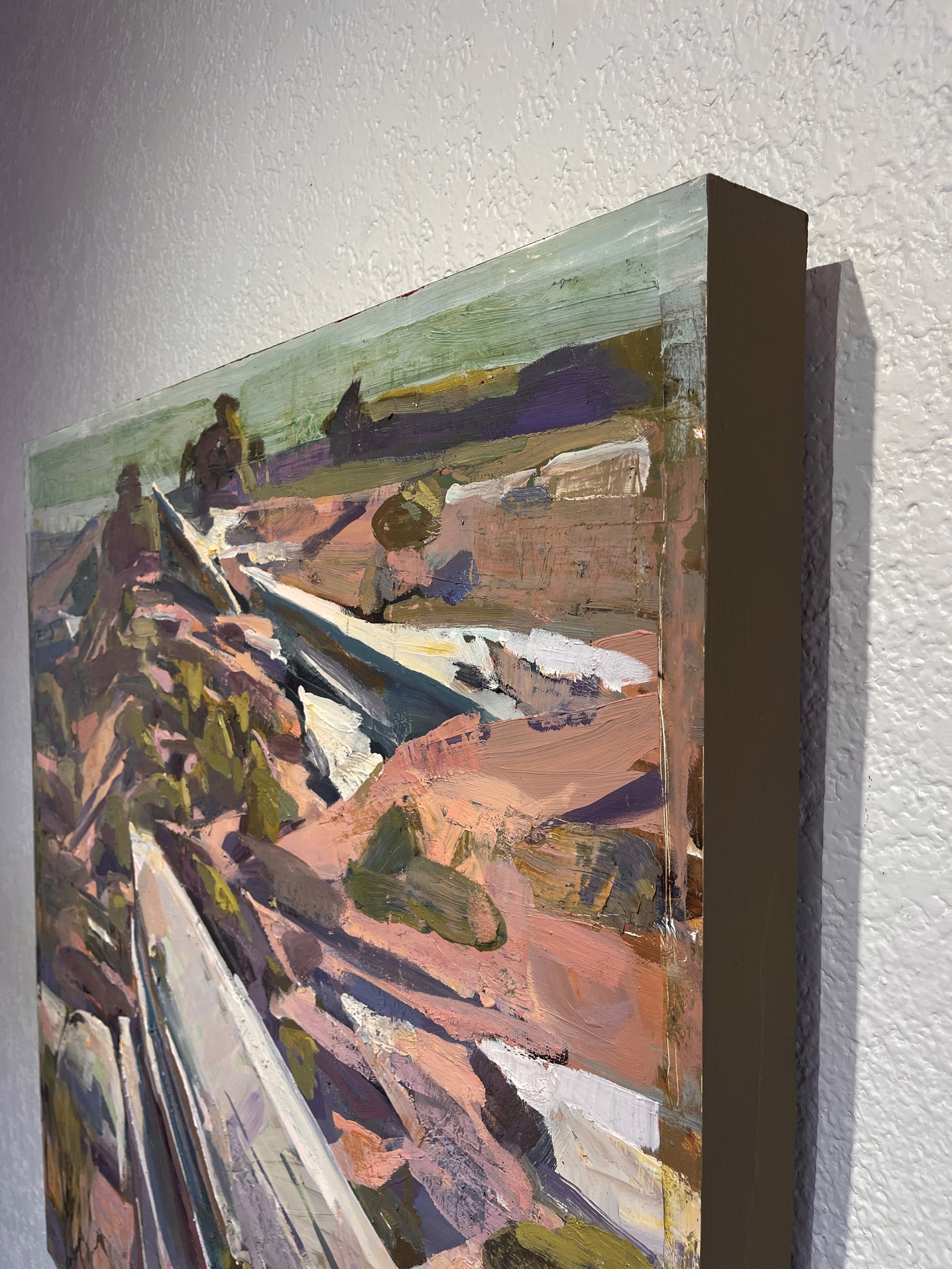 A painting of a boat sitting on top of a rocky hillside.