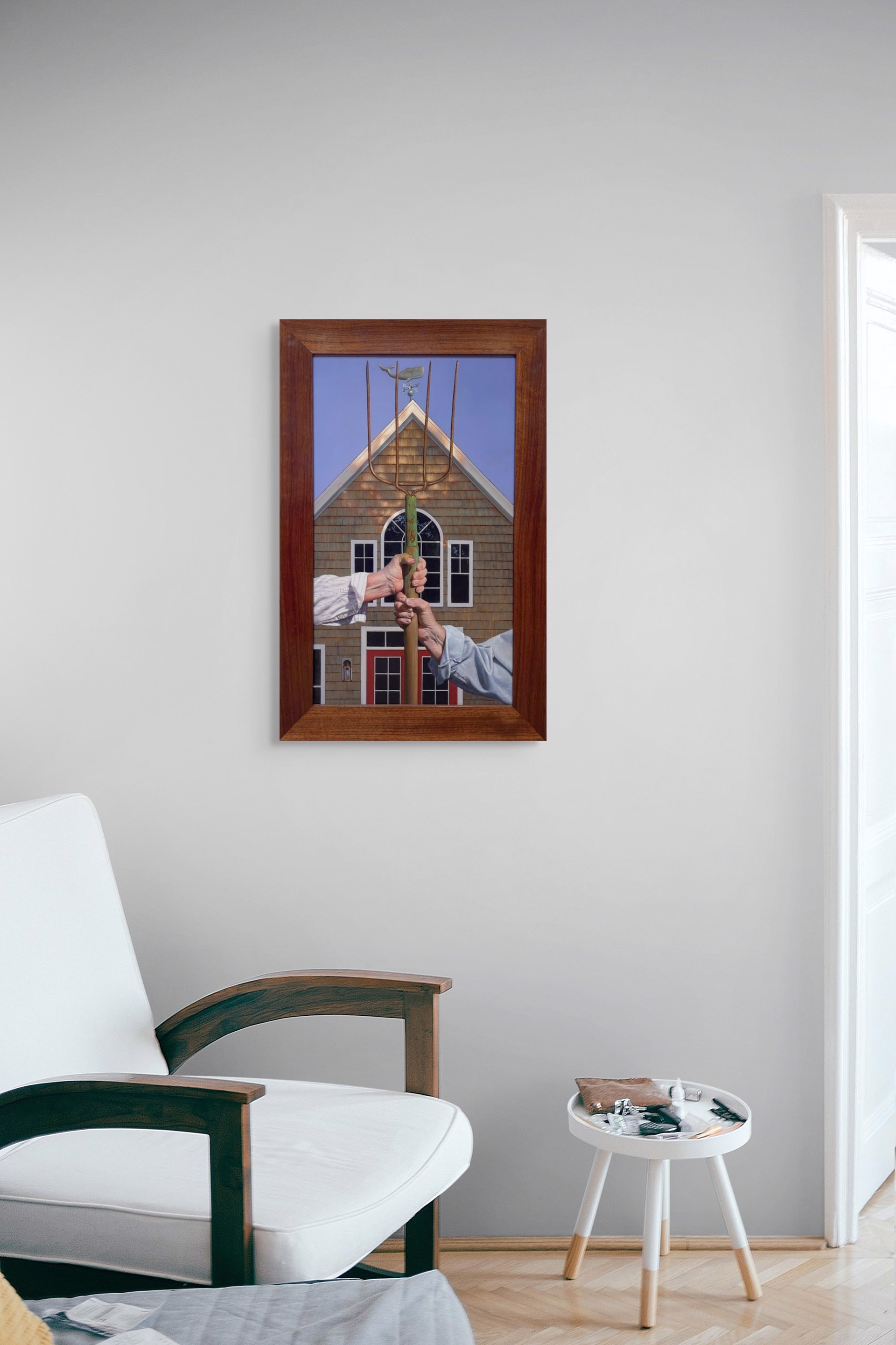 A painting of two hands holding a pitchfork in front of a house.