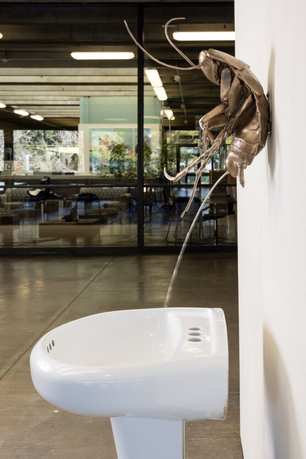 Artwork by Heidi Schwegler, A Ladies Man, Made of Bronze, fountain motor, bucket, plumbing 