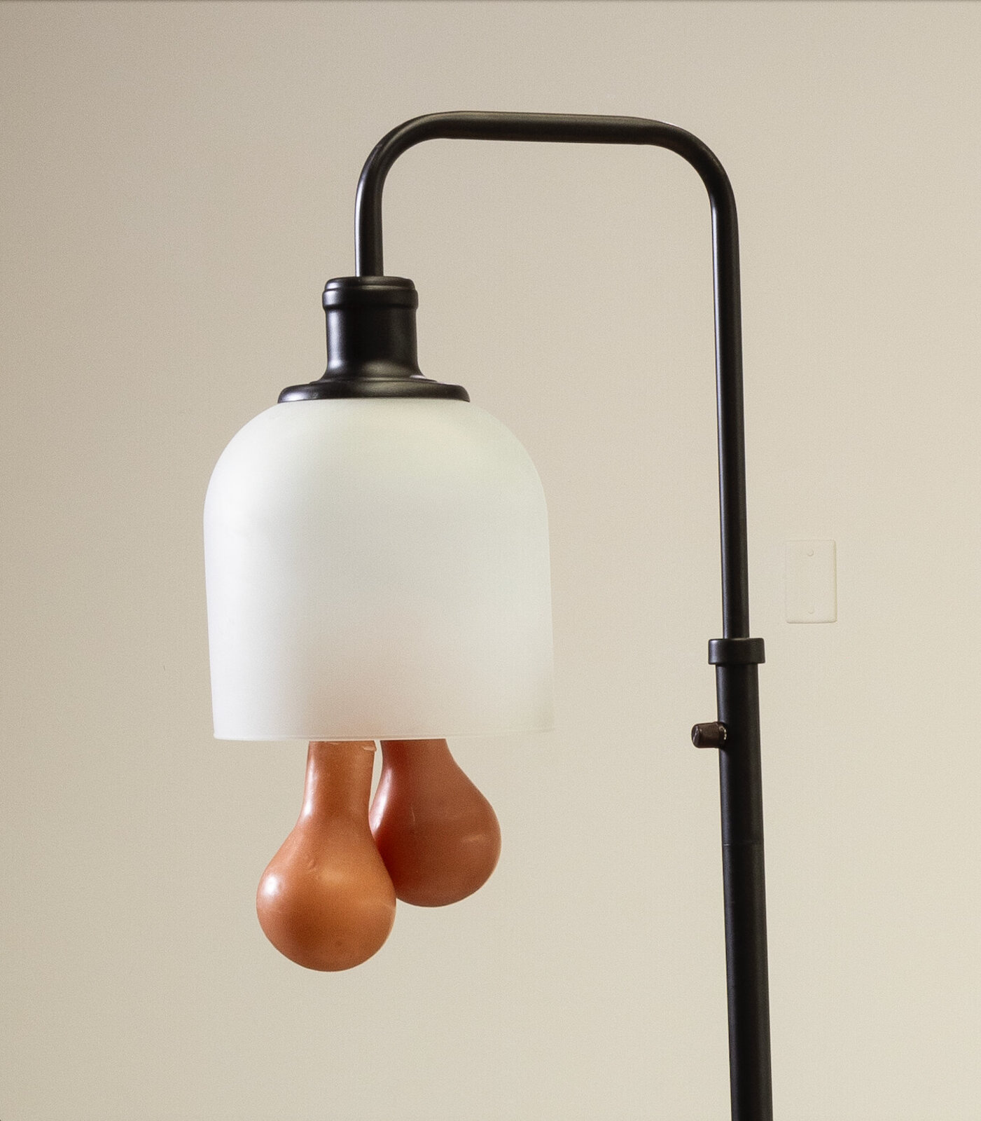 Artwork by Heidi Schwegler, Adult Situations, Made of Found object, wax, denim sandbag 