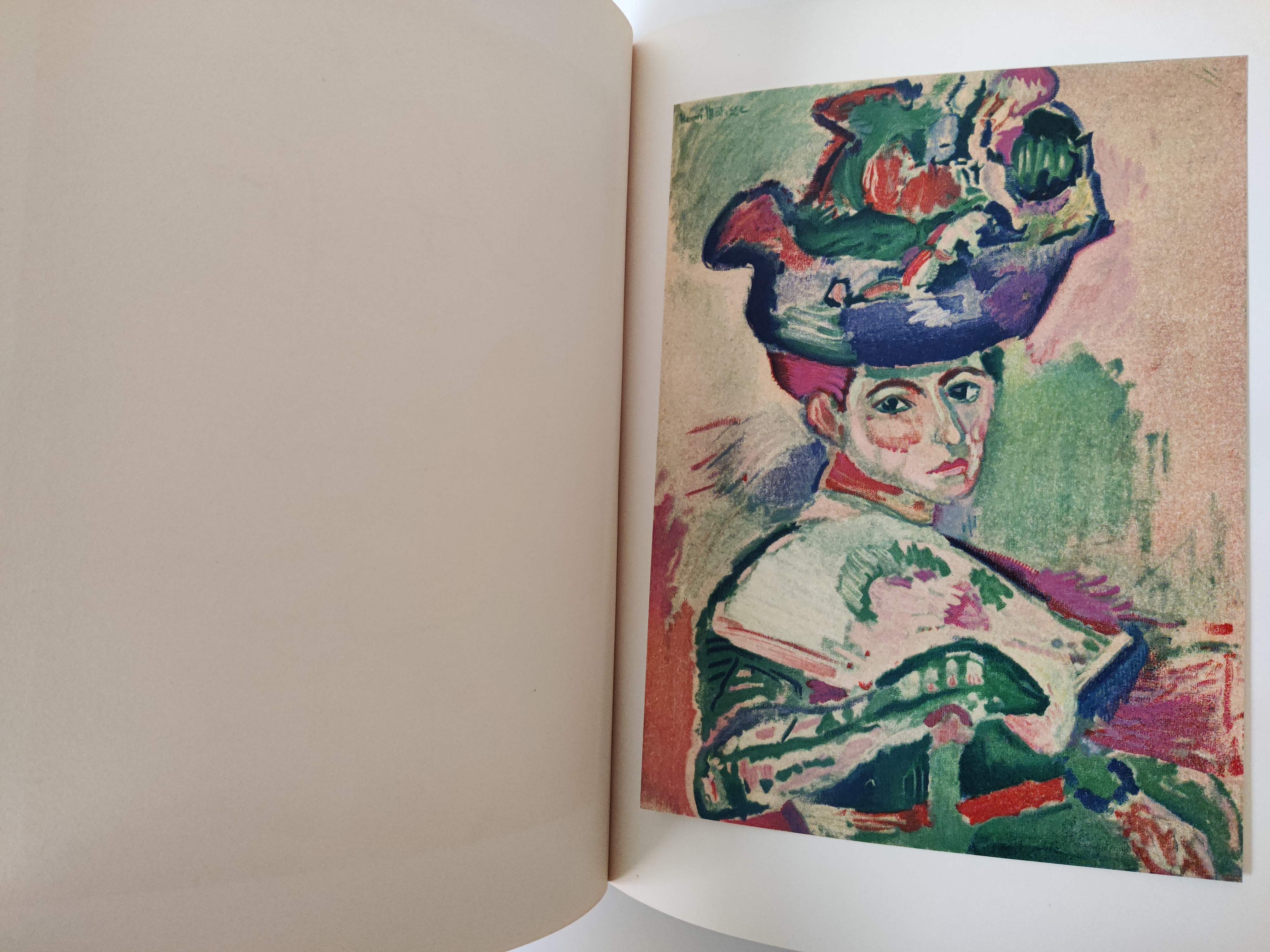 A graphic portrait book cover featuring a stylized face in bold colors.