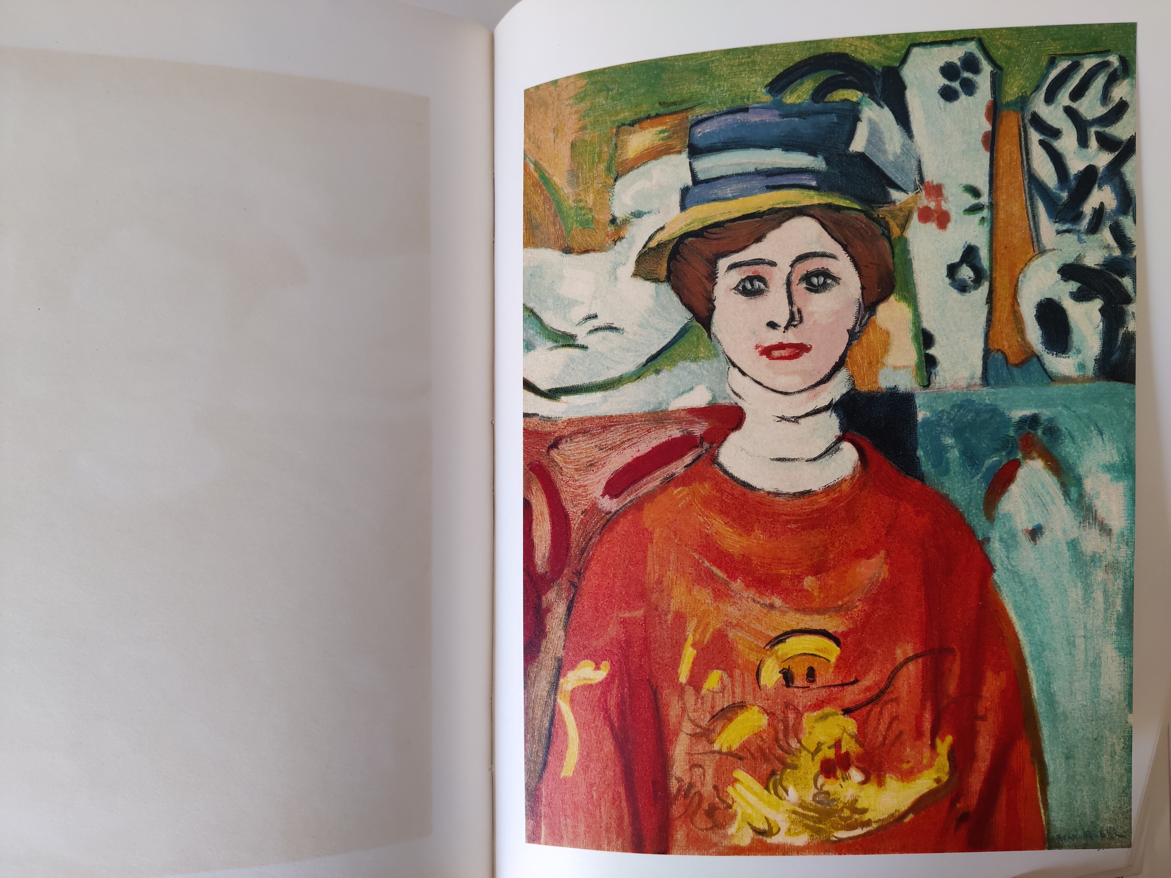 A graphic portrait book cover featuring a stylized face in bold colors.