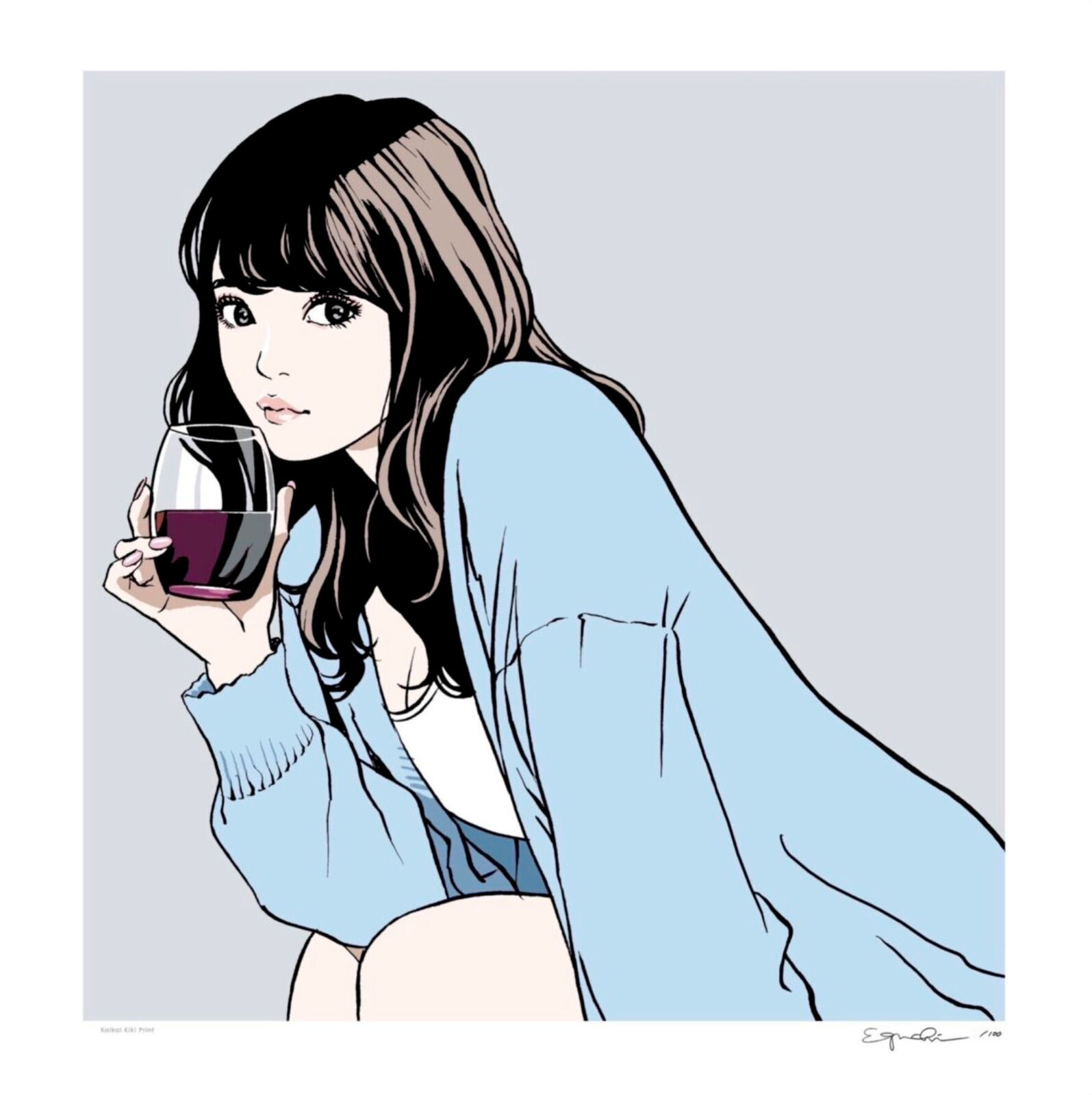 A woman holding a glass of wine in her hand.