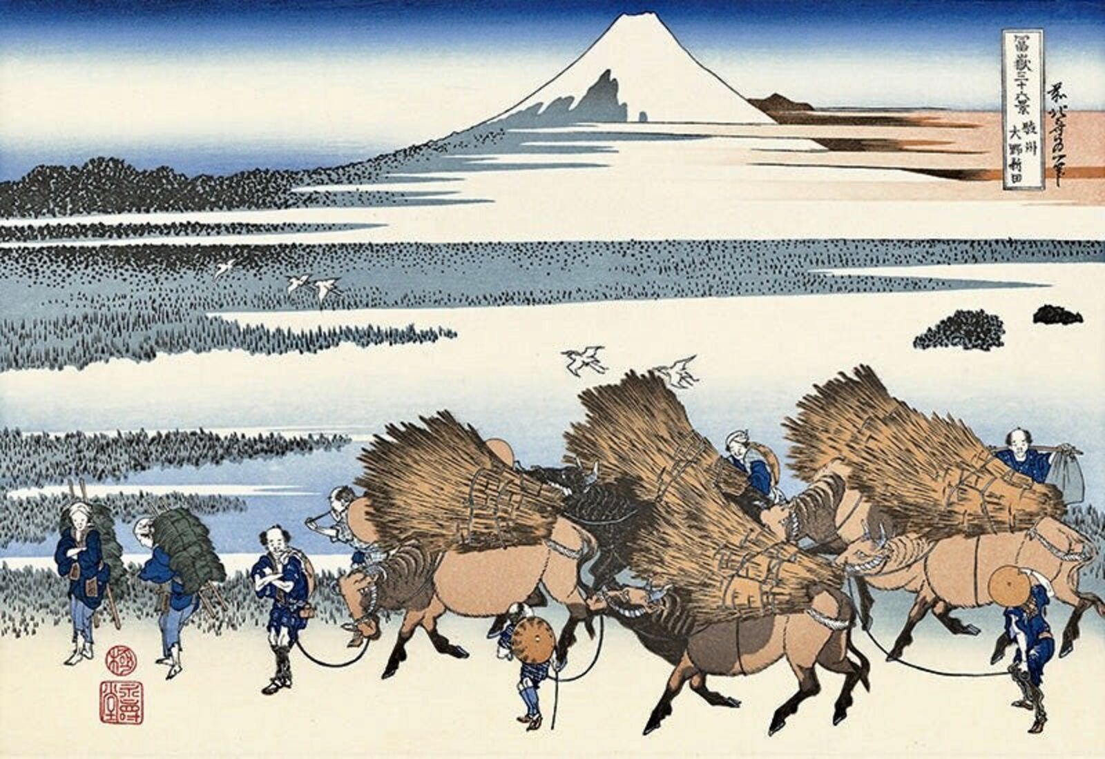 A group of people riding on the backs of donkeys.