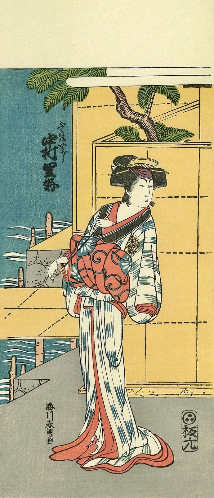 a woman in a kimono standing in front of a window