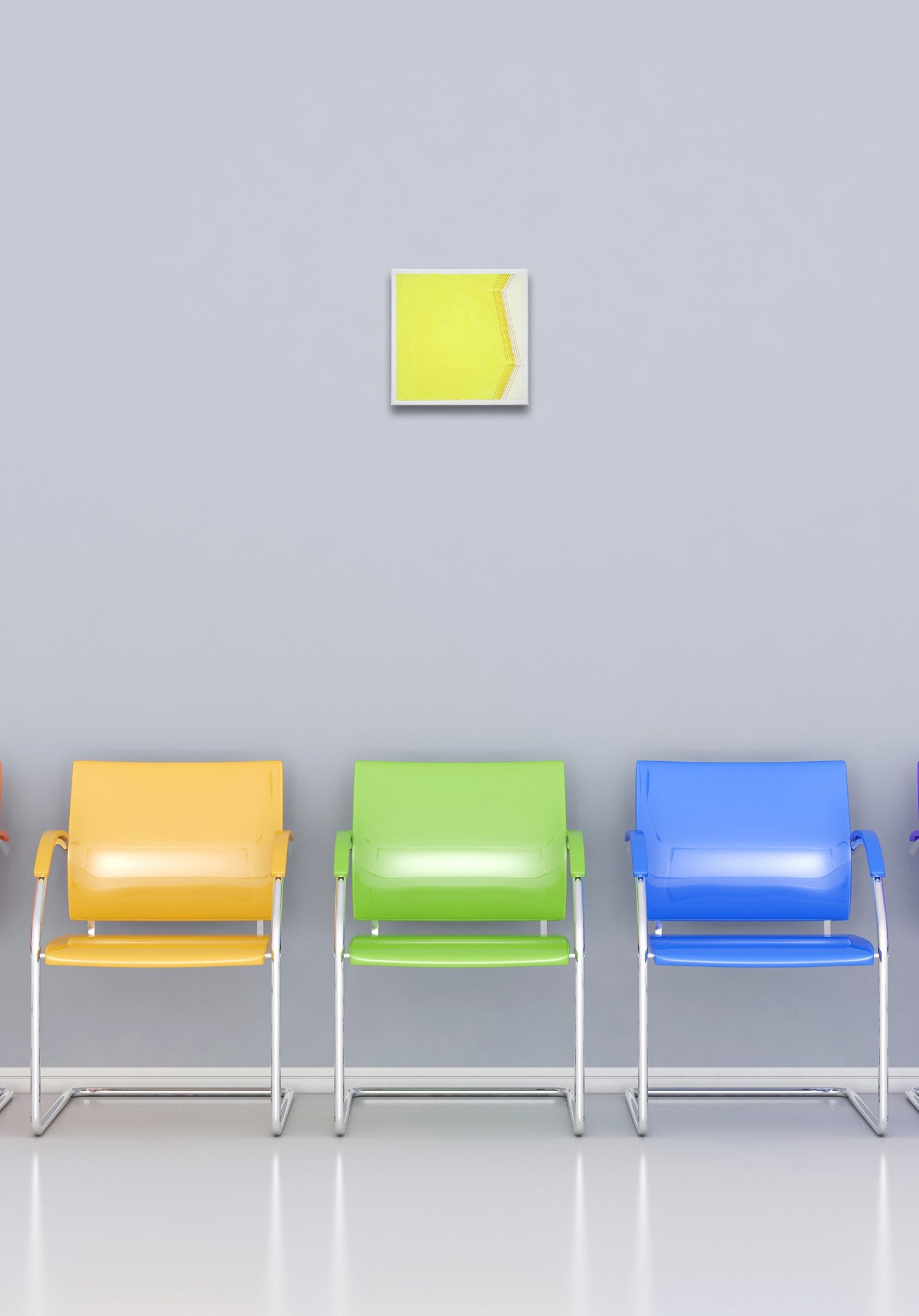 A yellow and white painting on a white wall.