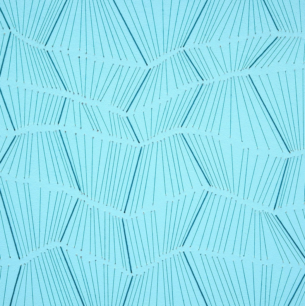 A blue and white abstract pattern on a white background.