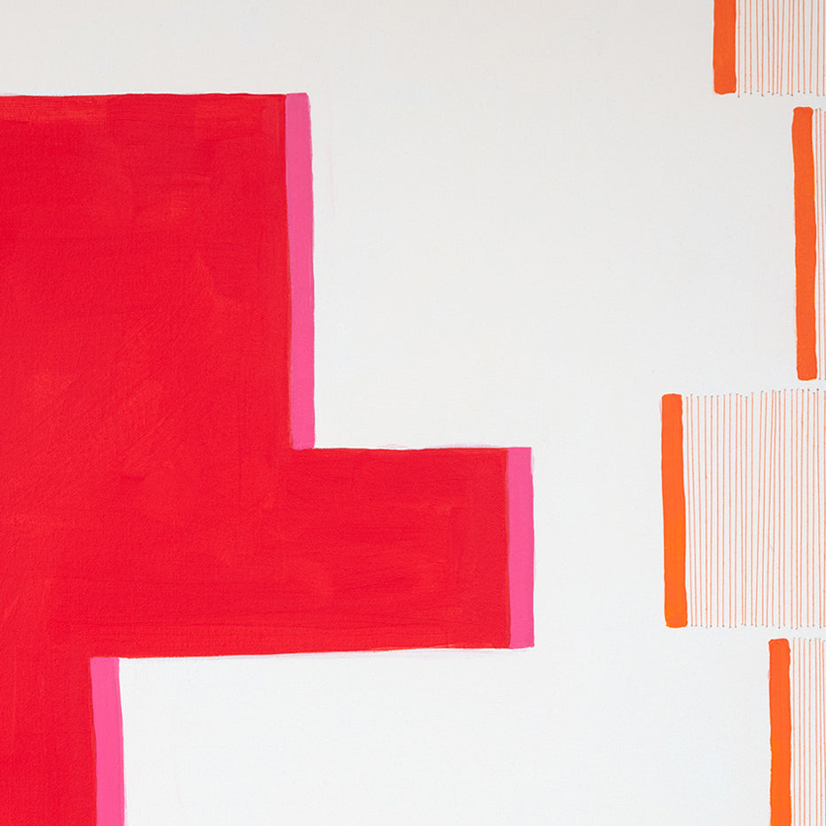 A painting on a white wall with a red and orange design.