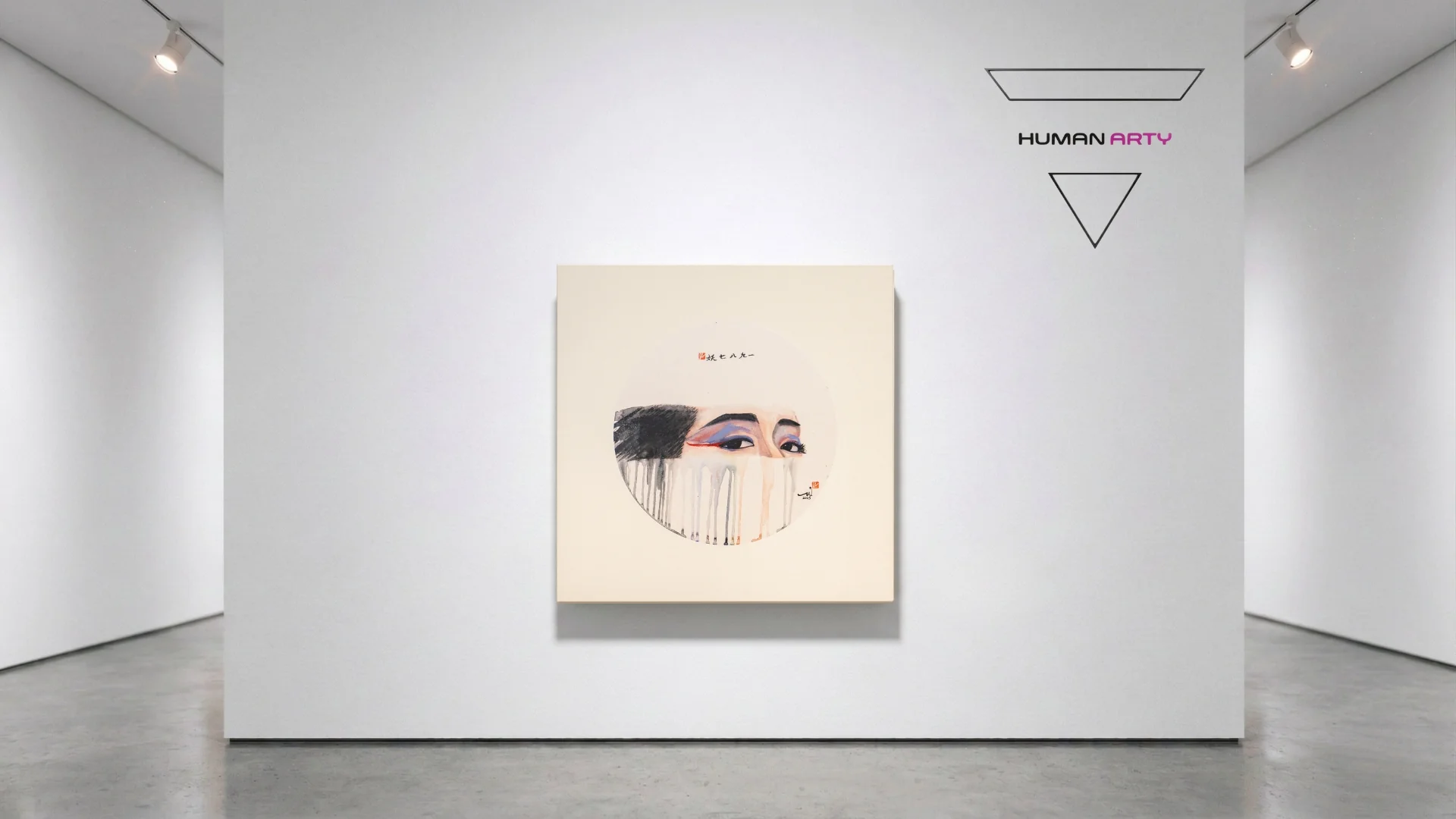 A minimalist gallery scene featuring a square artwork with an abstract face design.