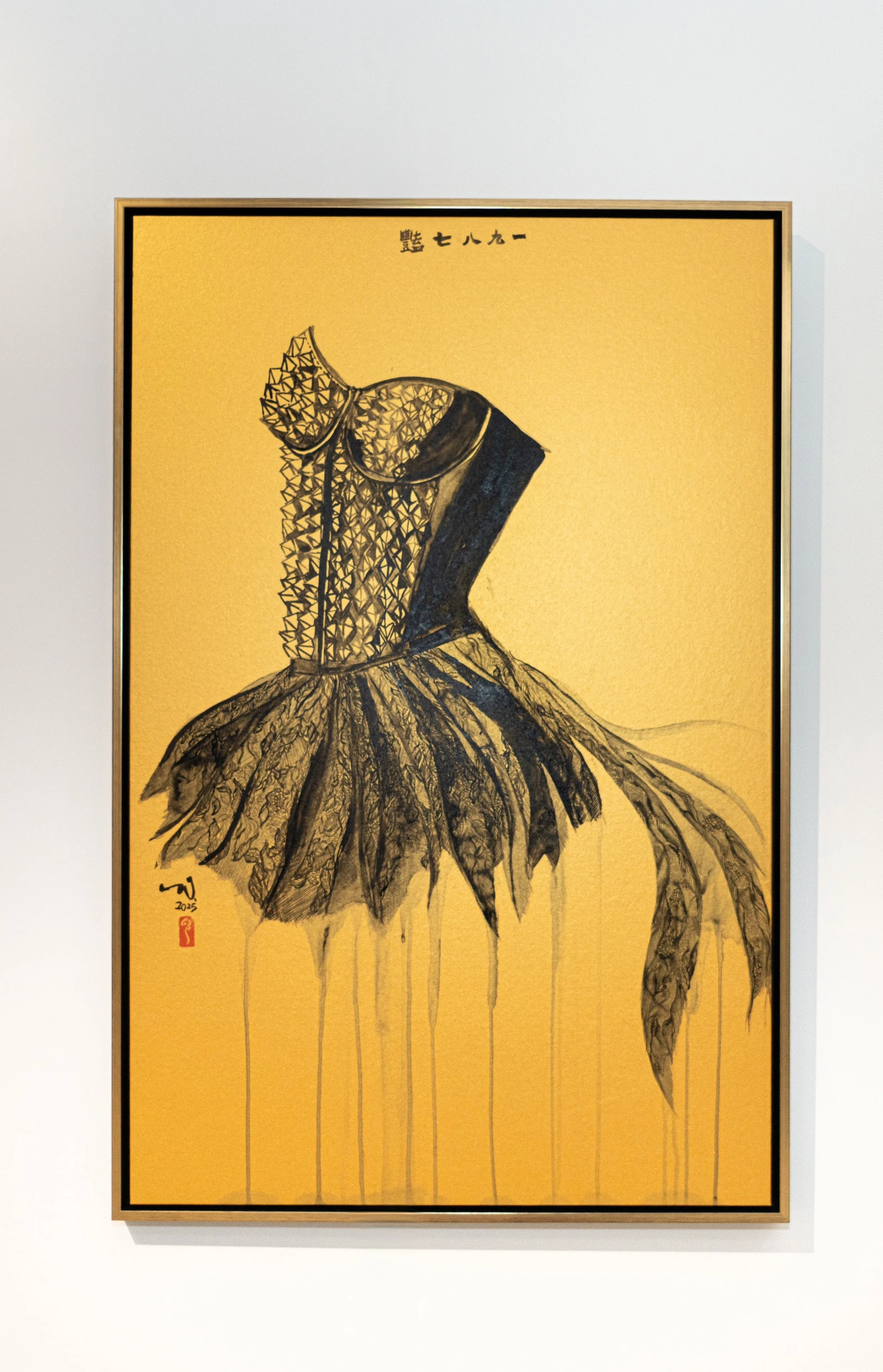 A framed artwork of a stylized corset on a golden background displayed in a gallery.