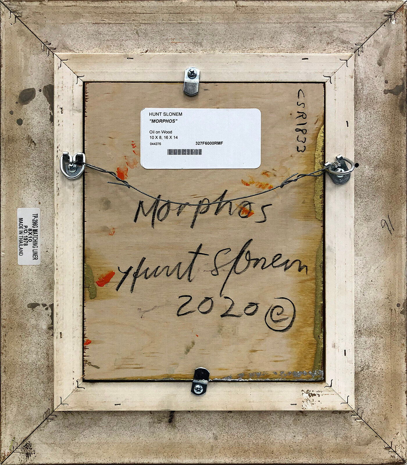 A painting of blue and red hearts on a gold background.