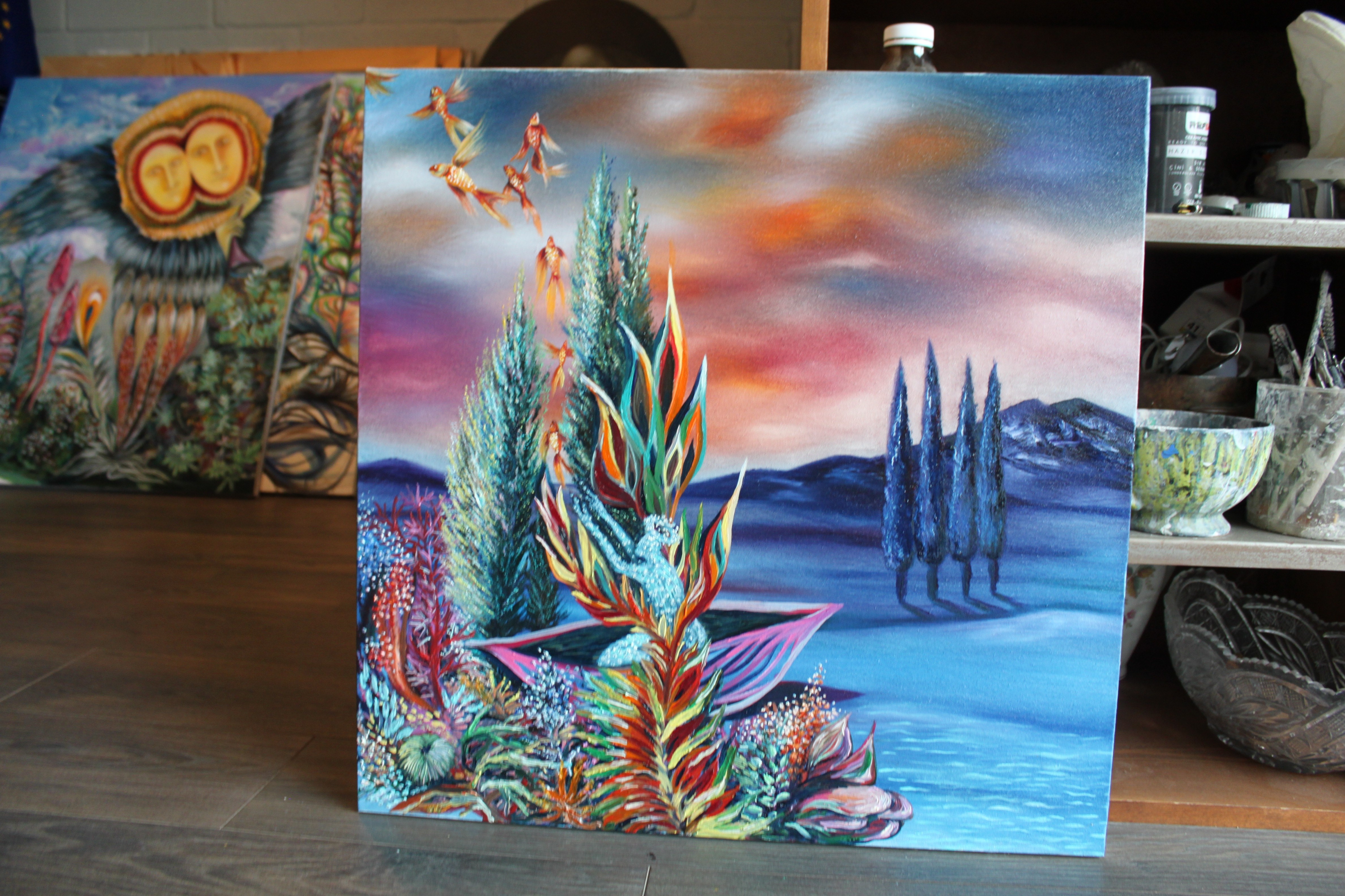 A painting on a table in a room with other paintings.