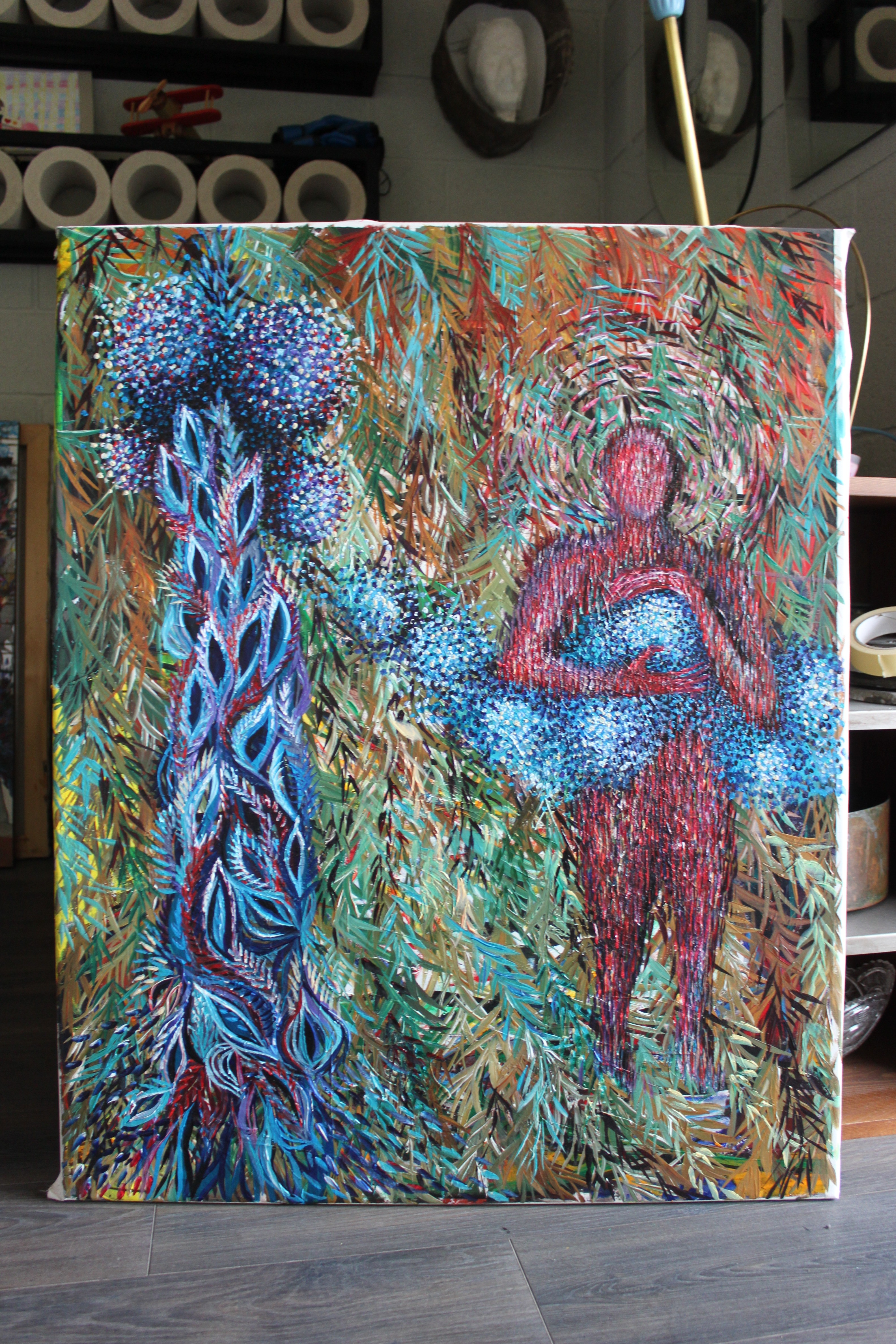 A painting of a man holding a baby in his arms.