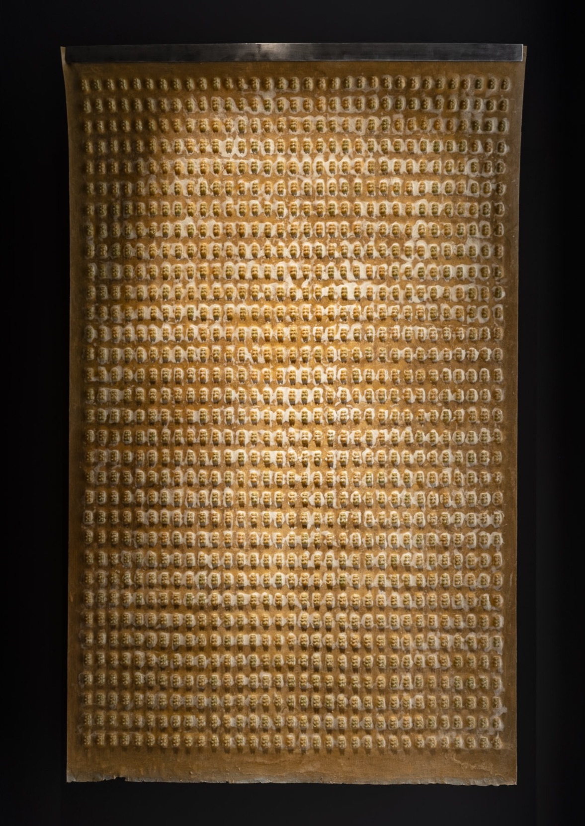 A large piece of gold on a black background.