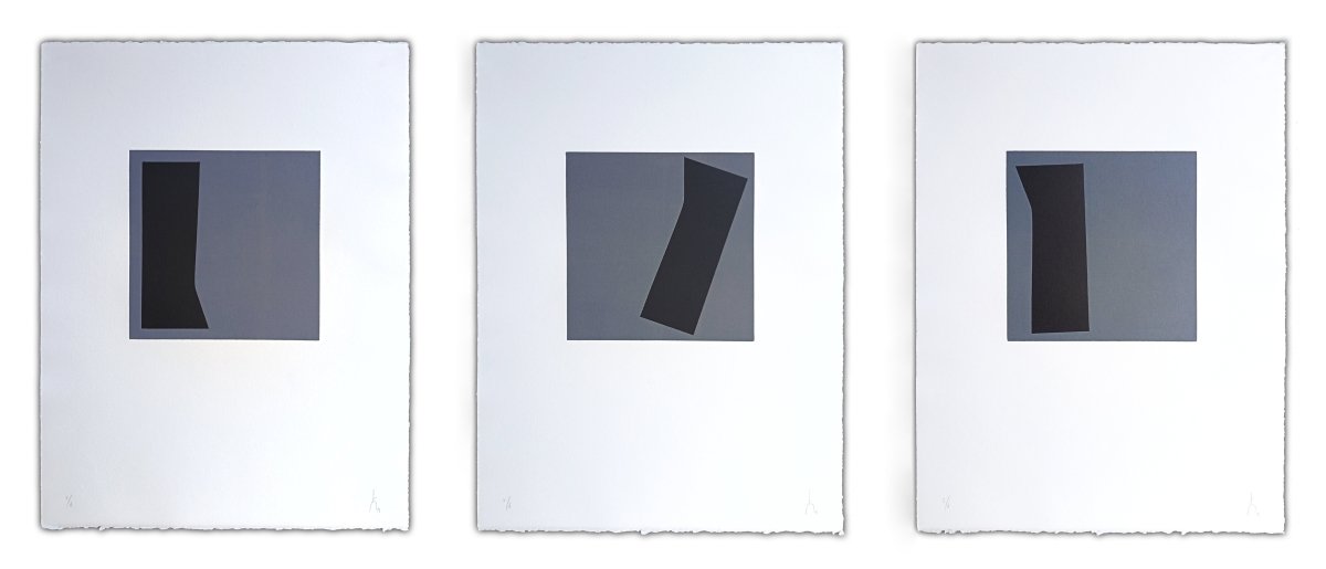 A triptych of minimalist abstract prints featuring dark geometric shapes on gray squares against white backgrounds.