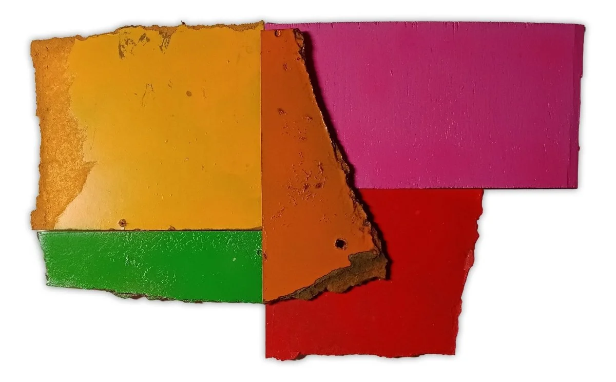 A colorful abstract composition of layered, torn rectangular shapes in primary and secondary colors.