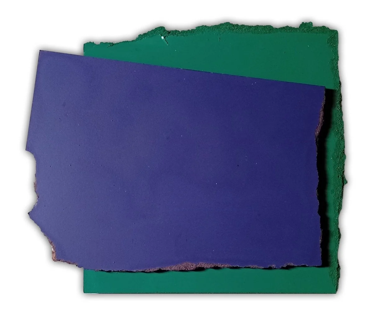 A layered composition of torn paper pieces in deep blue and forest green.