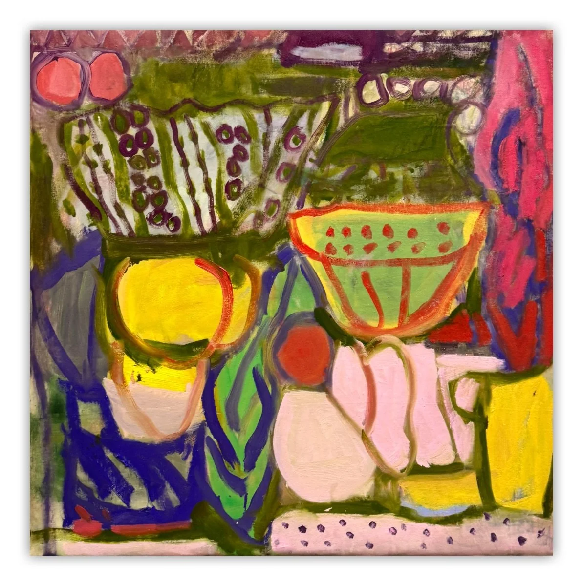 A vibrant still life featuring colorful ceramic vessels and fruit against a textured background.