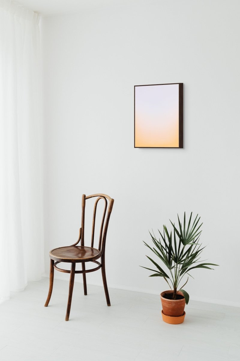 A minimalist vertical gradient artwork featuring a soft transition from pale lavender to warm peach.