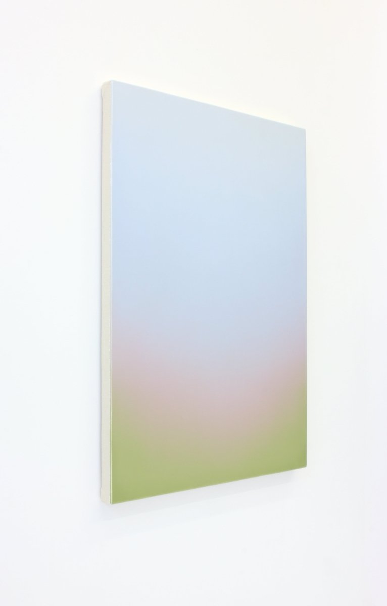 A minimalist vertical gradient artwork featuring a soft, seamless blend of pastel blue, pink, and yellow.