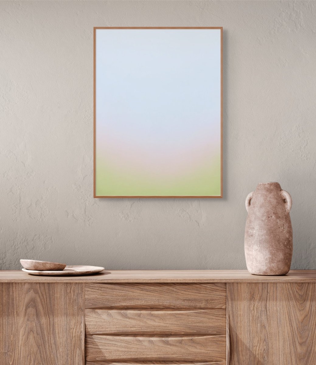 A minimalist vertical gradient artwork featuring a soft, seamless blend of pastel blue, pink, and yellow.