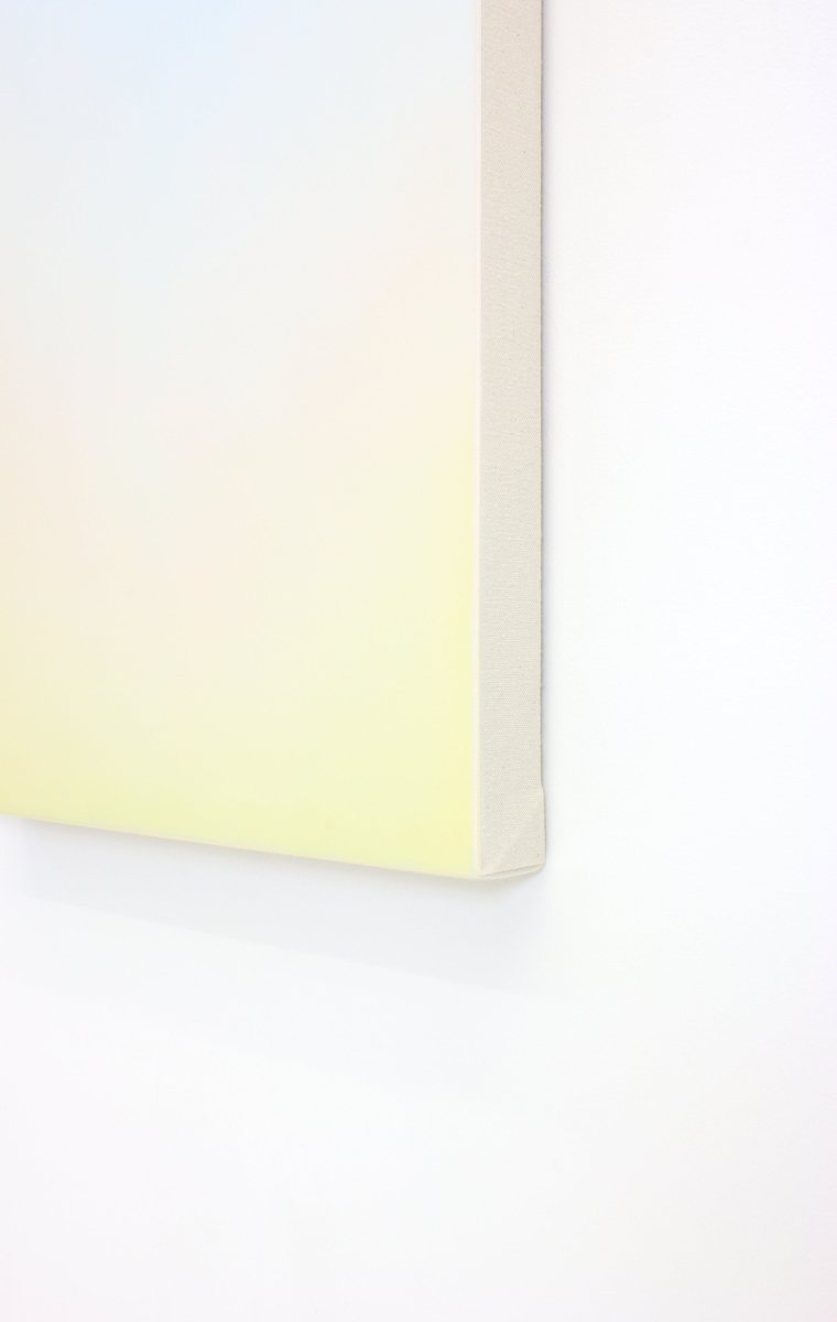 A minimalist vertical gradient artwork transitioning from pale blue to soft yellow.