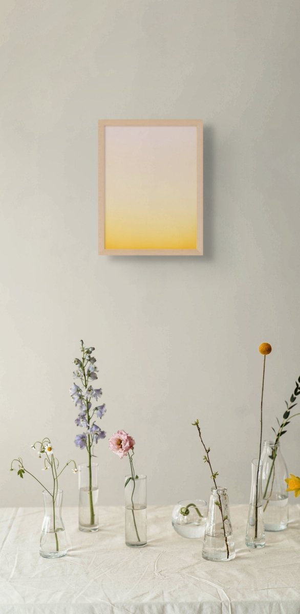 A minimalist vertical gradient artwork transitioning from pale pink to warm yellow.