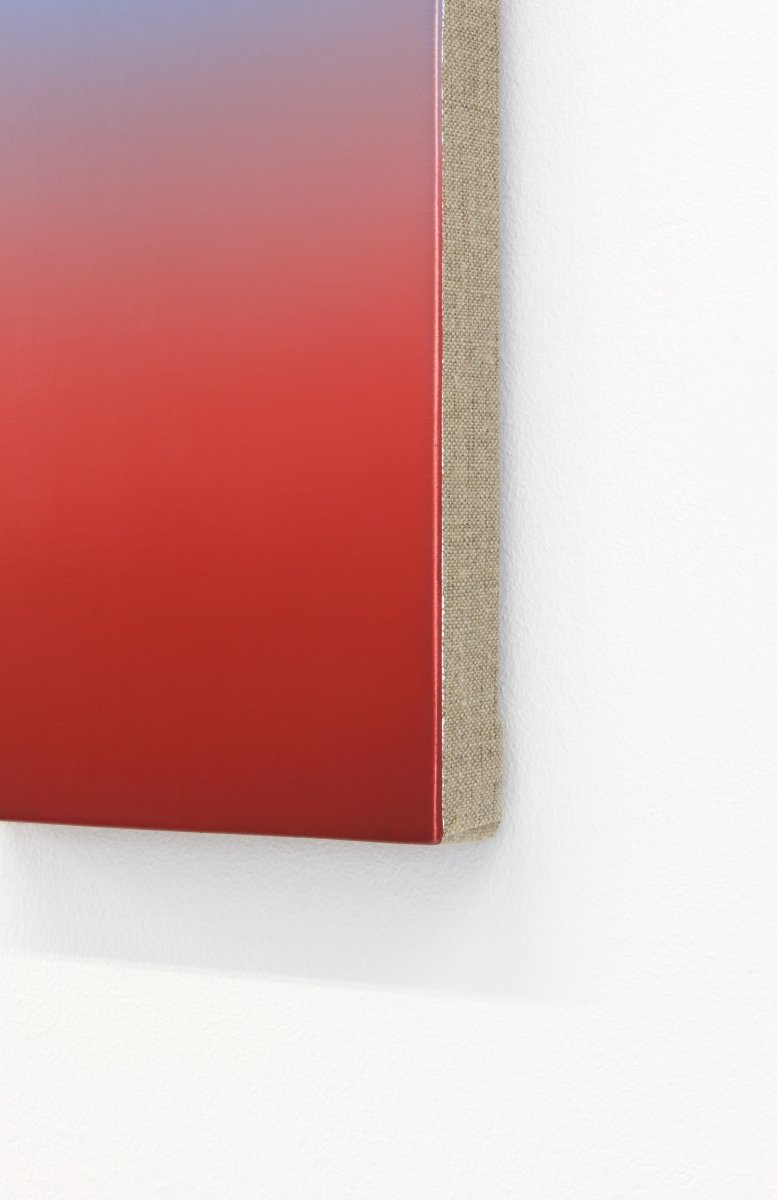 A vertical gradient canvas transitioning from cool blue at the top to deep red at the bottom.