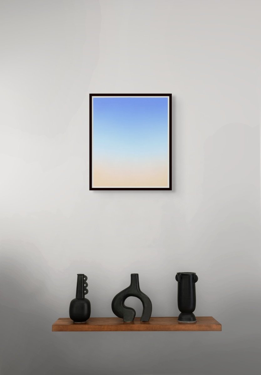 A minimalist vertical gradient artwork transitioning from deep blue to soft peach.