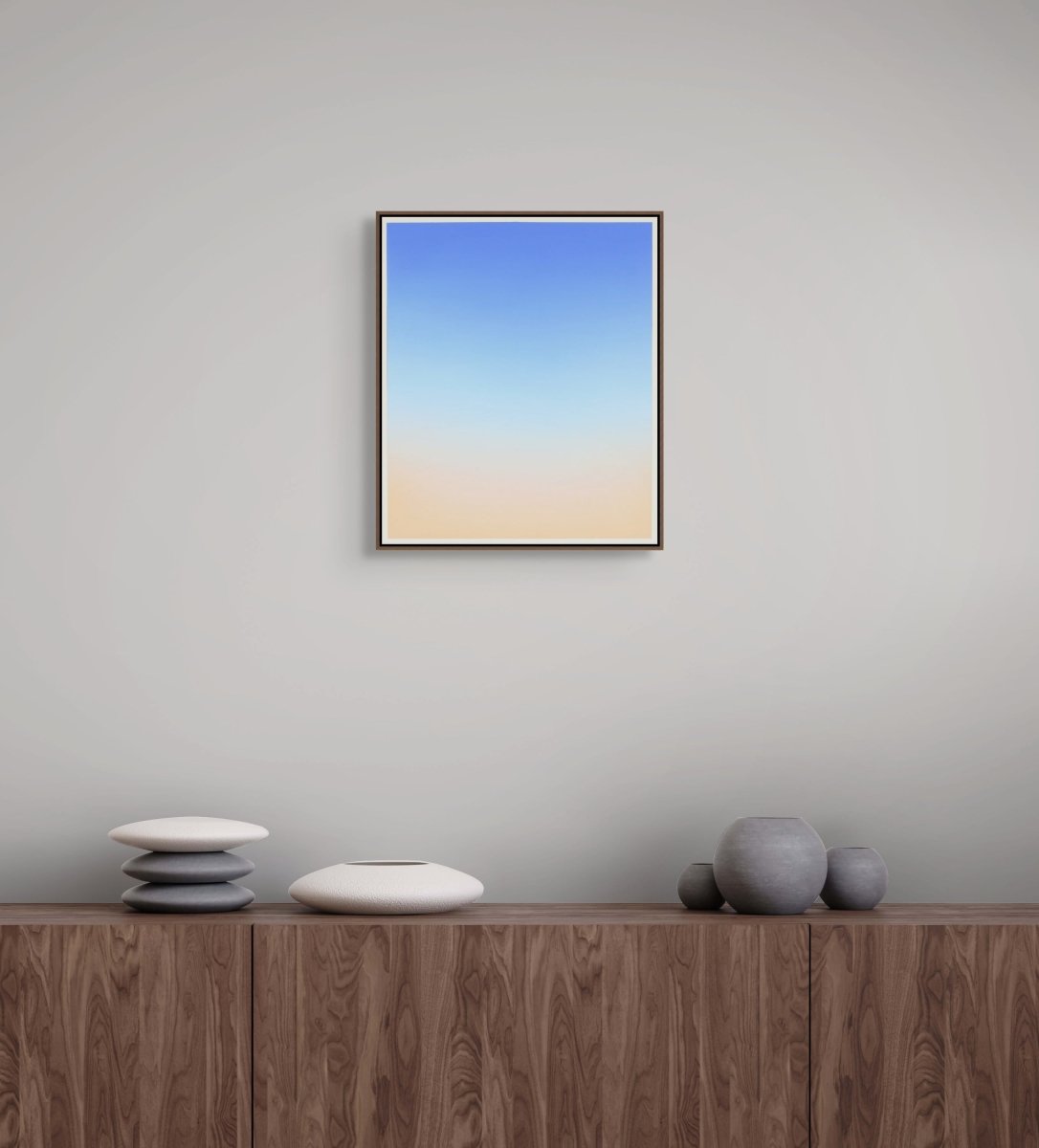 A minimalist vertical gradient artwork transitioning from deep blue to soft peach.