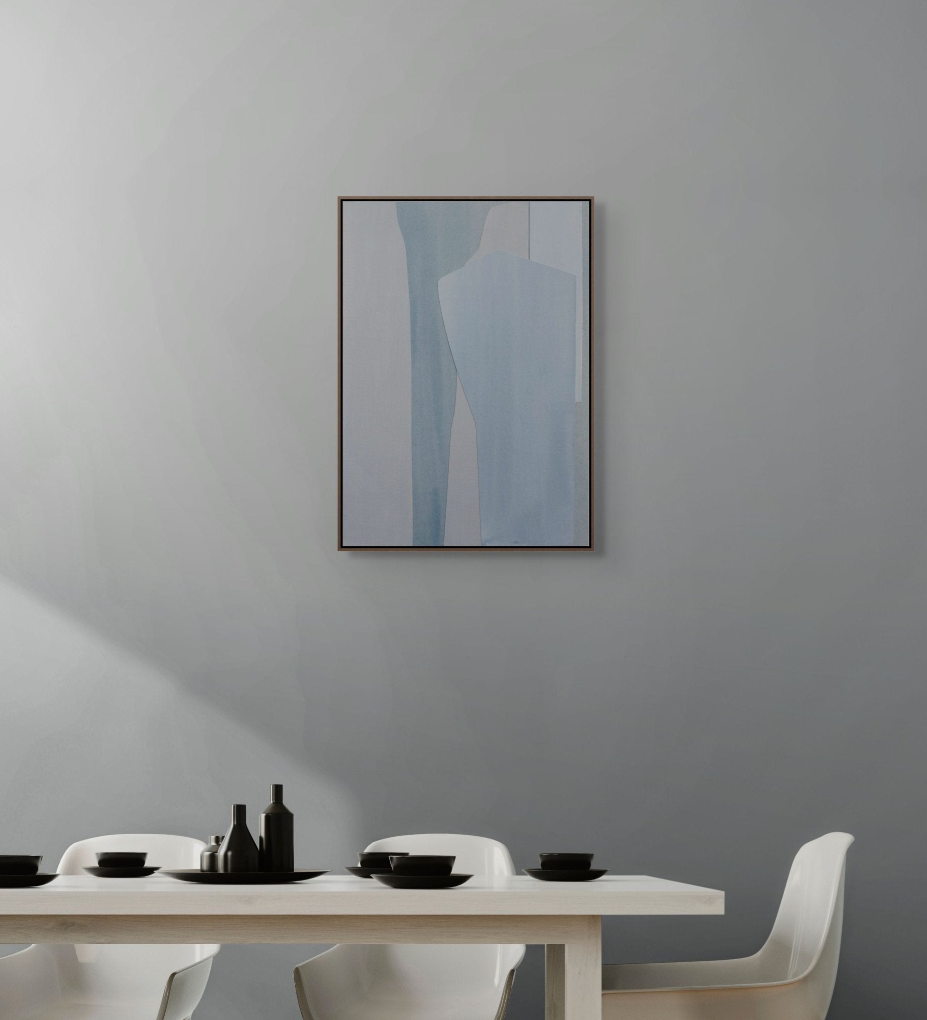 A minimalist abstract composition featuring layered geometric shapes in cool blue and grey tones.