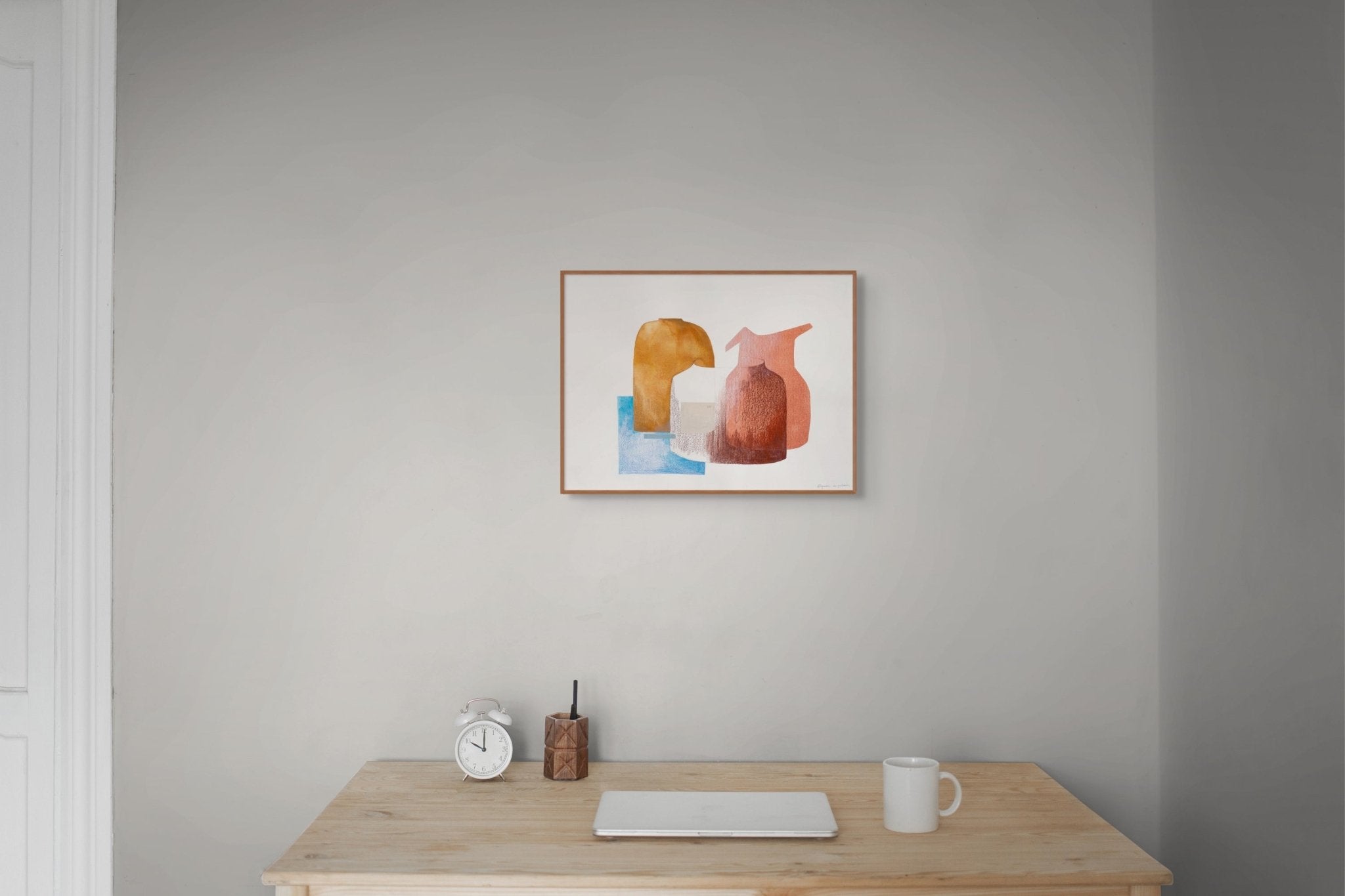 A mixed-media still life featuring two ceramic vessels and a blue geometric base.