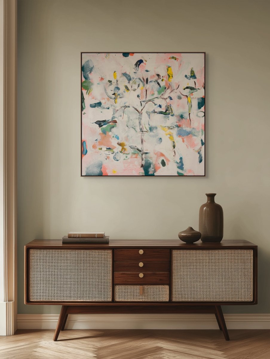 An abstract painting featuring a central tree-like form amidst a vibrant, chaotic background.