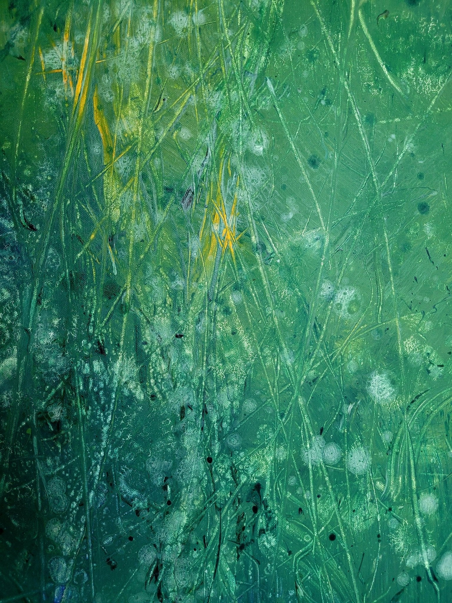 An abstract green and blue painting with a glowing center.