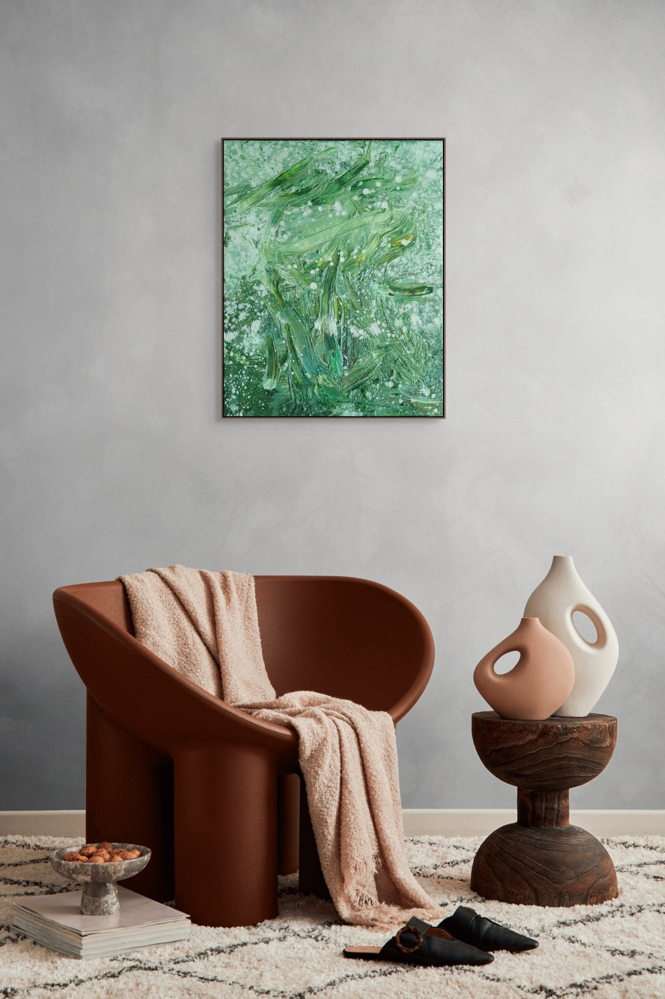 An abstract oil painting featuring a face formed by thick green brushstrokes and white splatters.