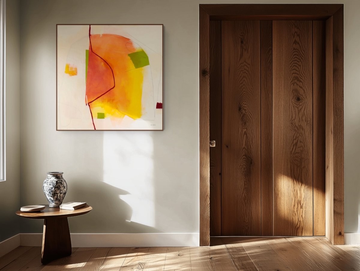 An abstract composition featuring warm orange and yellow shapes against a pale background with thin black lines.