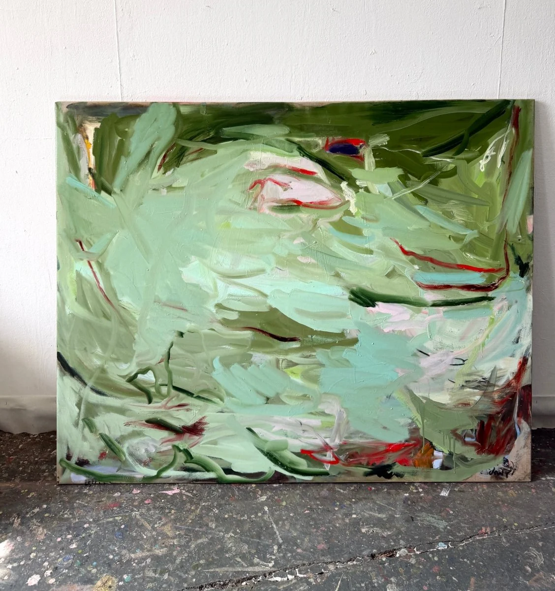 An abstract expressionist painting featuring a chaotic, layered composition of green and white strokes with sharp red accents.