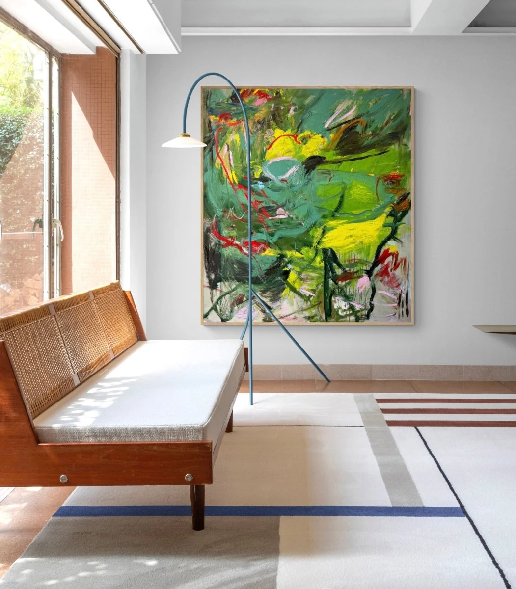 An abstract expressionist painting featuring a chaotic, energetic composition of green and yellow forms with sharp red accents.