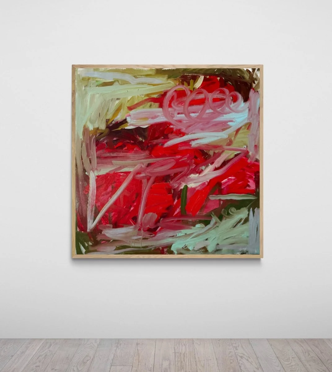 A vibrant abstract painting featuring bold reds and greens with expressive brushwork.