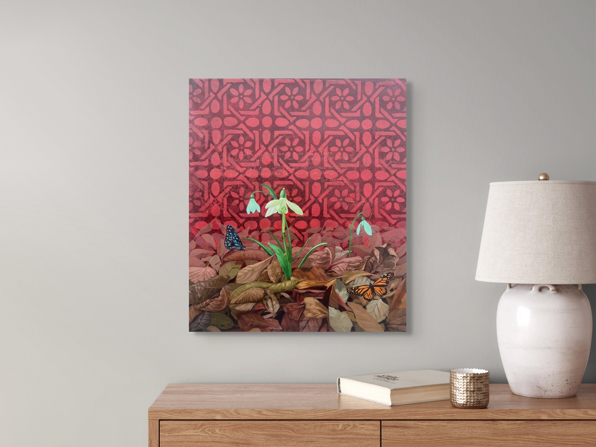 A painting of snowdrops and butterflies on a red background.