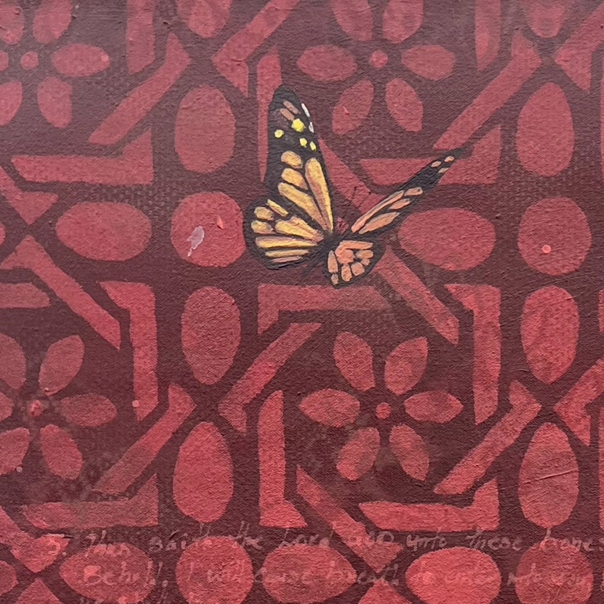 A painting of skulls and flowers with butterflies on them.