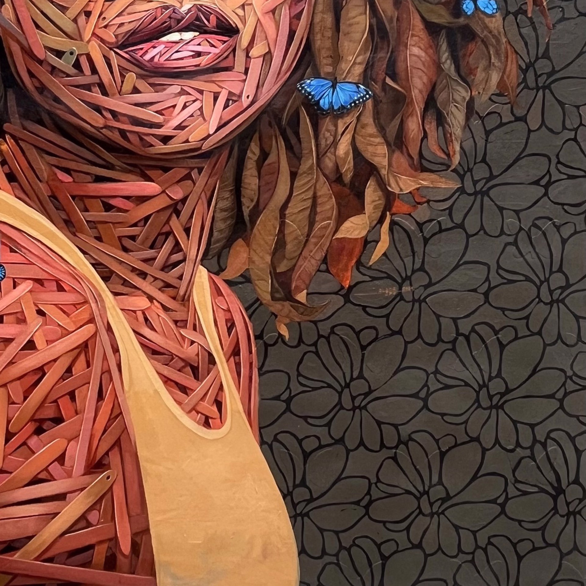 A painting of a woman with flowers and butterflies on her head.