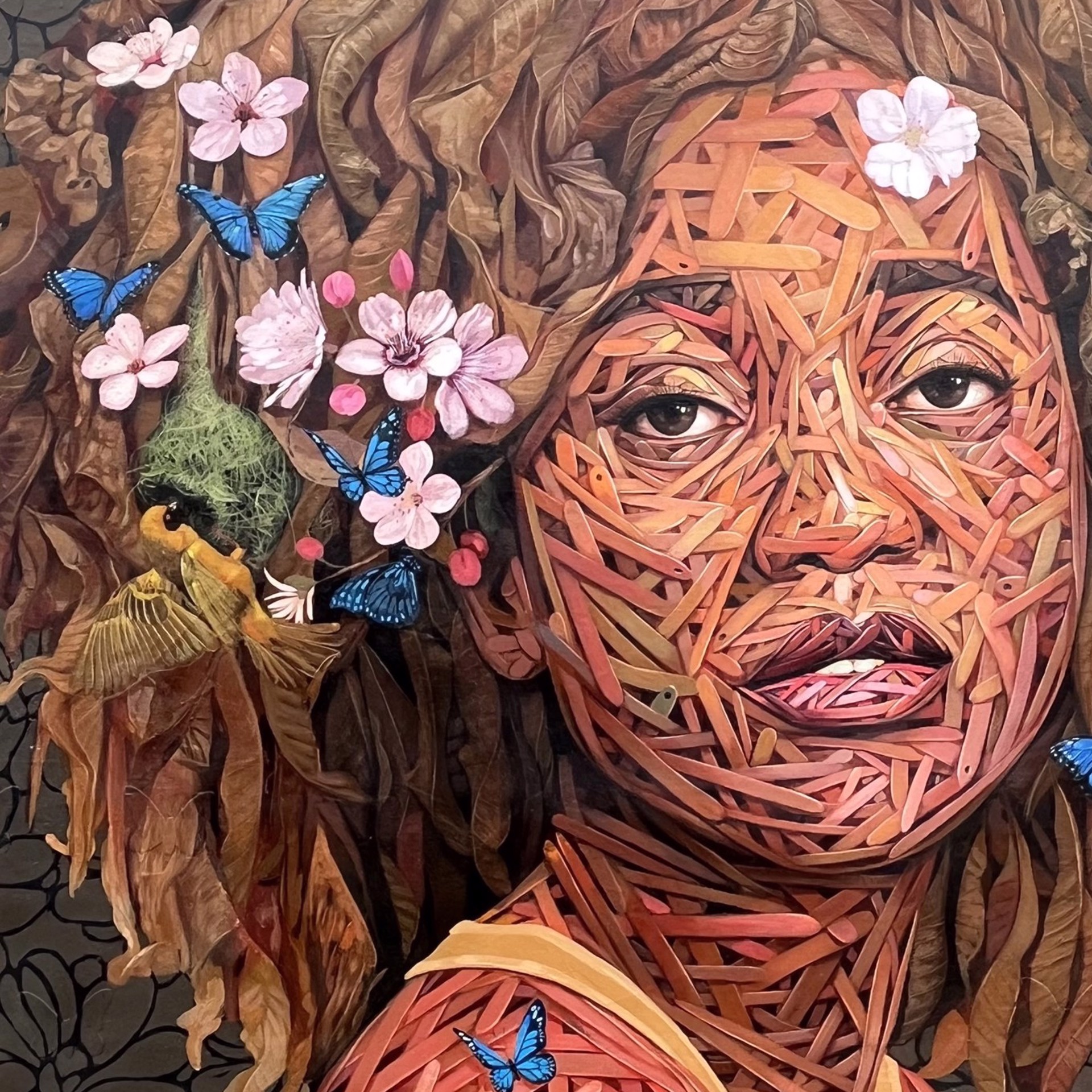 A painting of a woman with flowers and butterflies on her head.