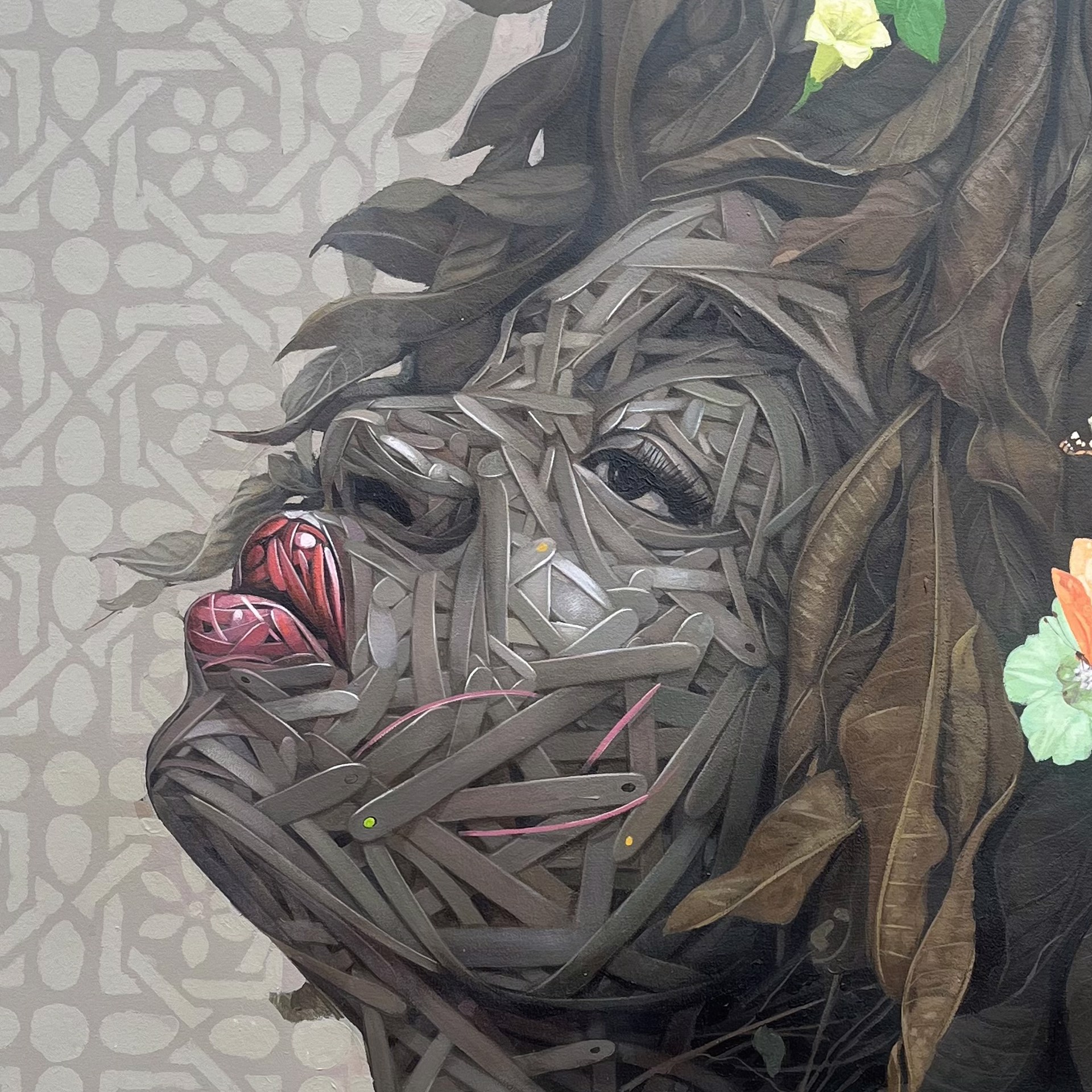 A painting of a woman with flowers and butterflies on her head.