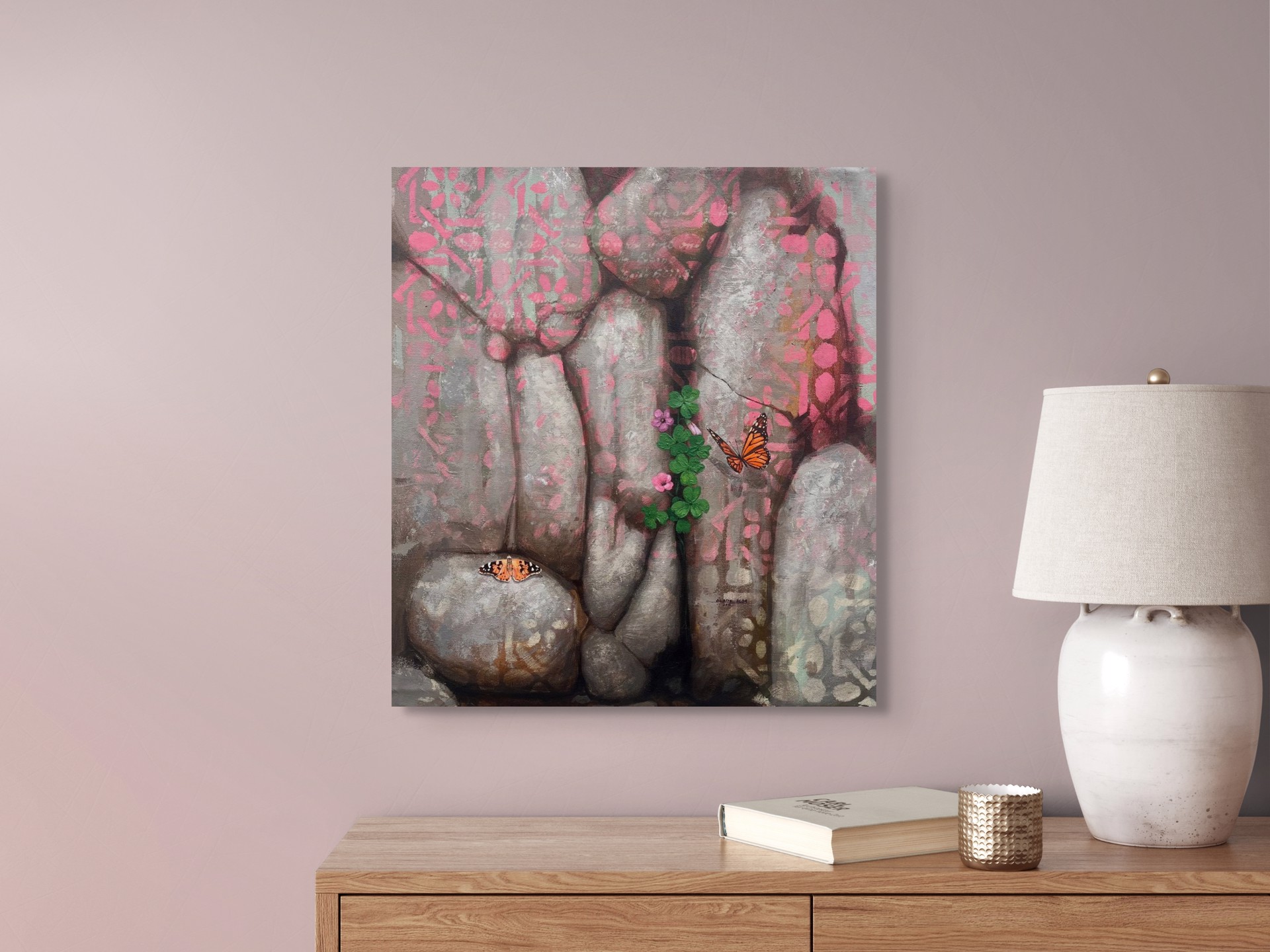 A painting of two butterflies sitting on a rock wall.