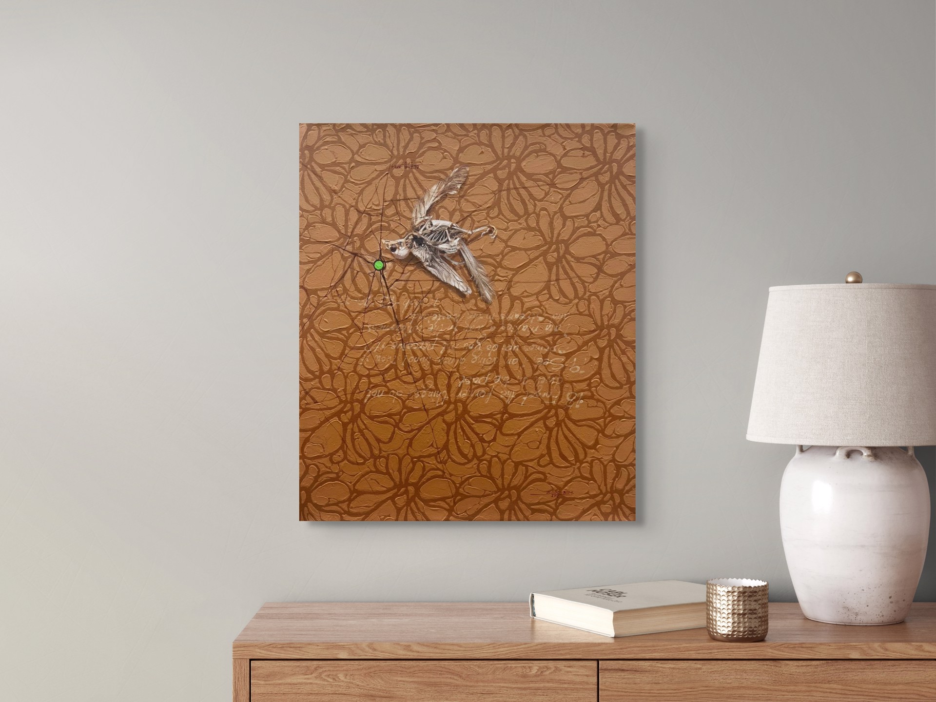 A drawing of a spider on a brown background.