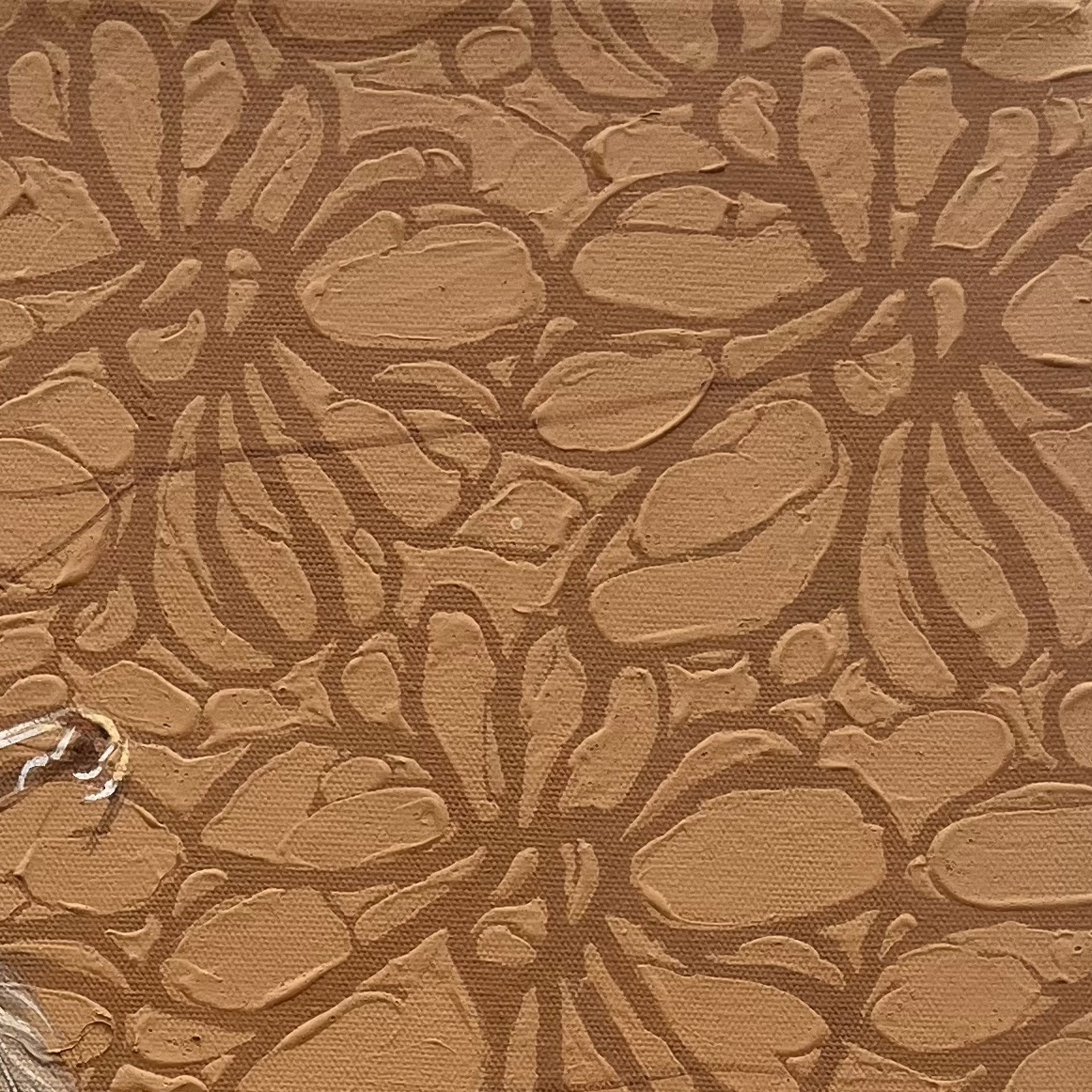 A drawing of a spider on a brown background.