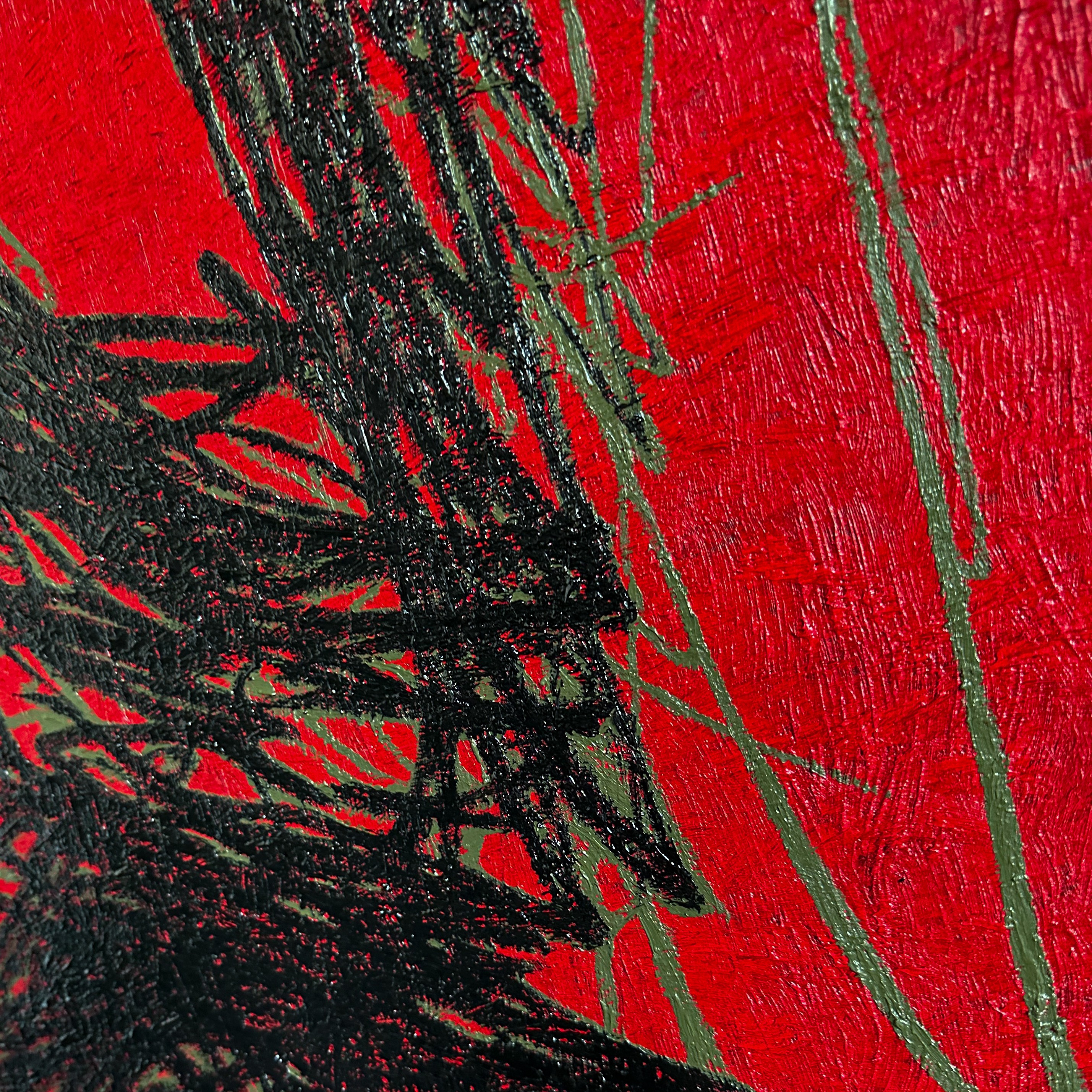 A close up of a painting on a red background.