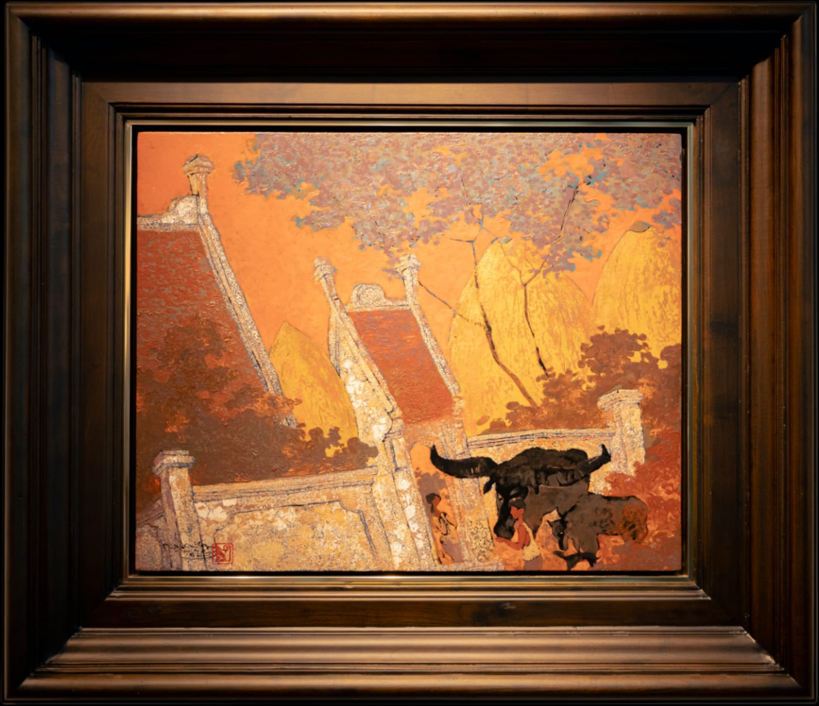 A warm-toned landscape painting featuring temple roofs, a water buffalo, and figures under a textured sky.